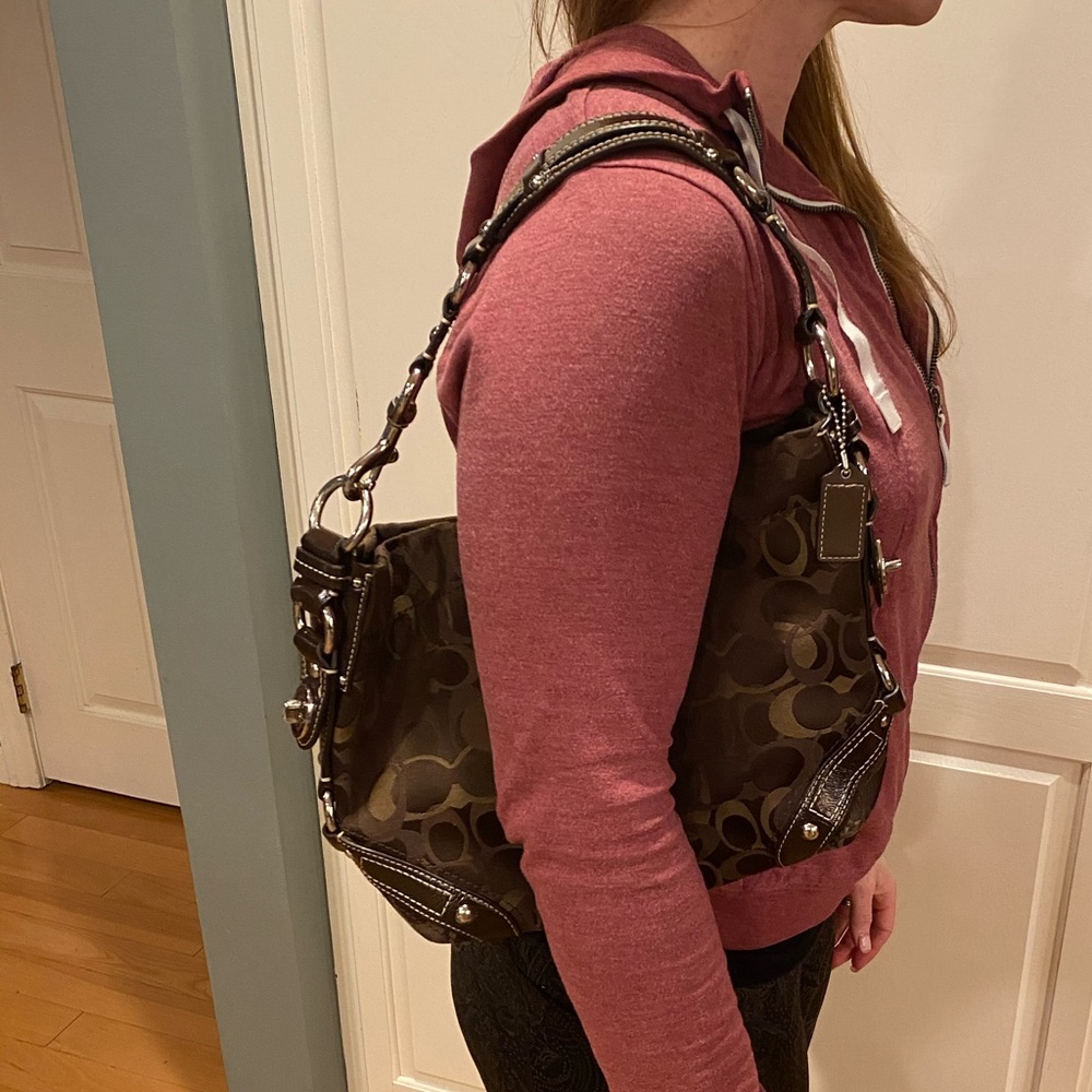 Brown and Tan COACH purse amazing handle detail